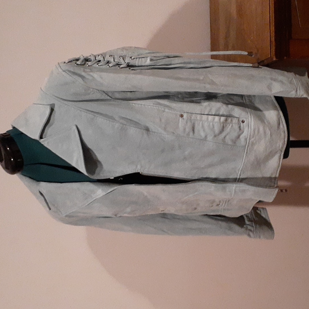 Baby blue leather jacket by Pamela Mccoy.